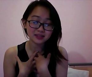 Cute and off colour Asian teen,..